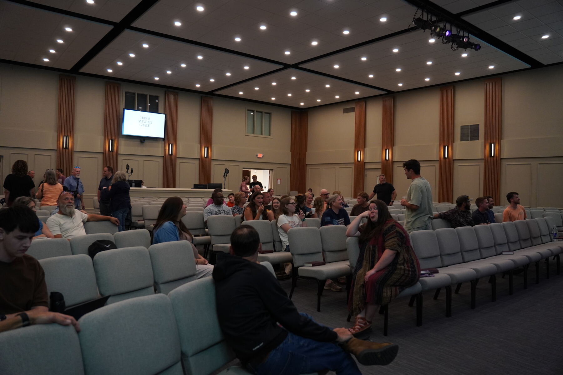 The room gathering before the worship night begins
