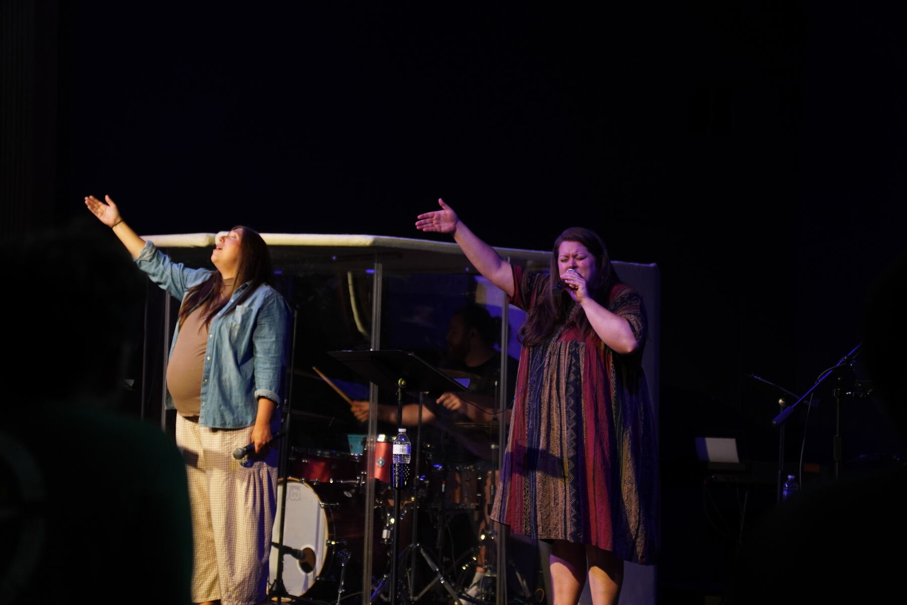 A pastor teaching from the stage